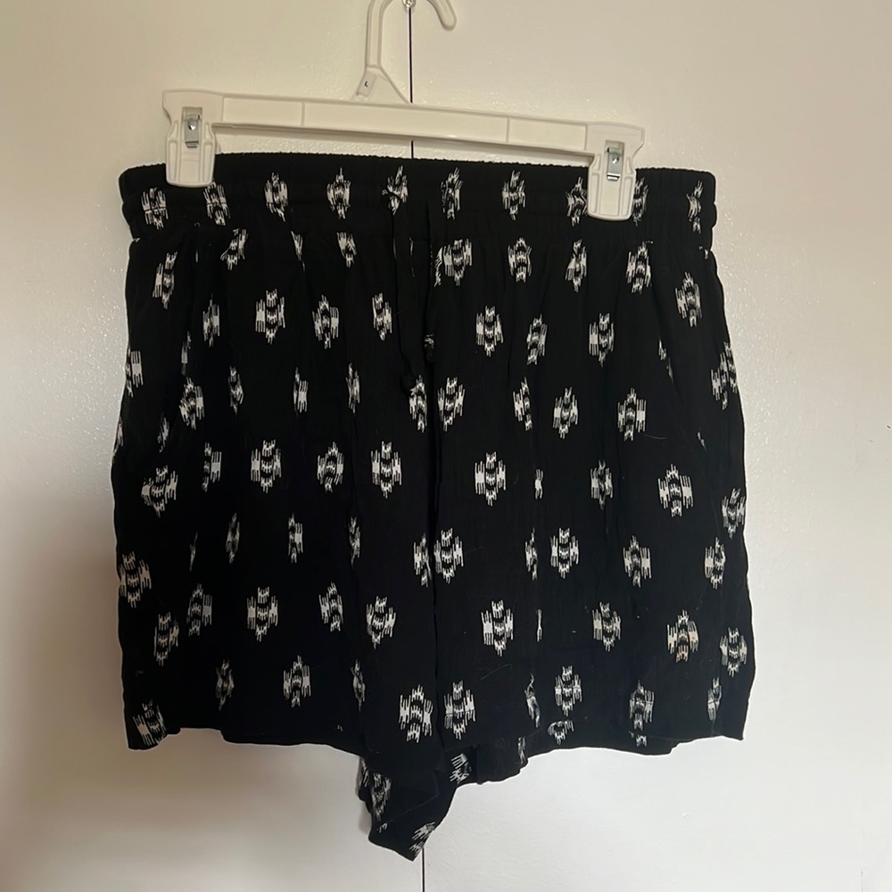 black tribal shorts. size S